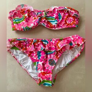 NWOT!  Shoshanna floral bikini with ruffle detailing.  Size D top/ L bottom.